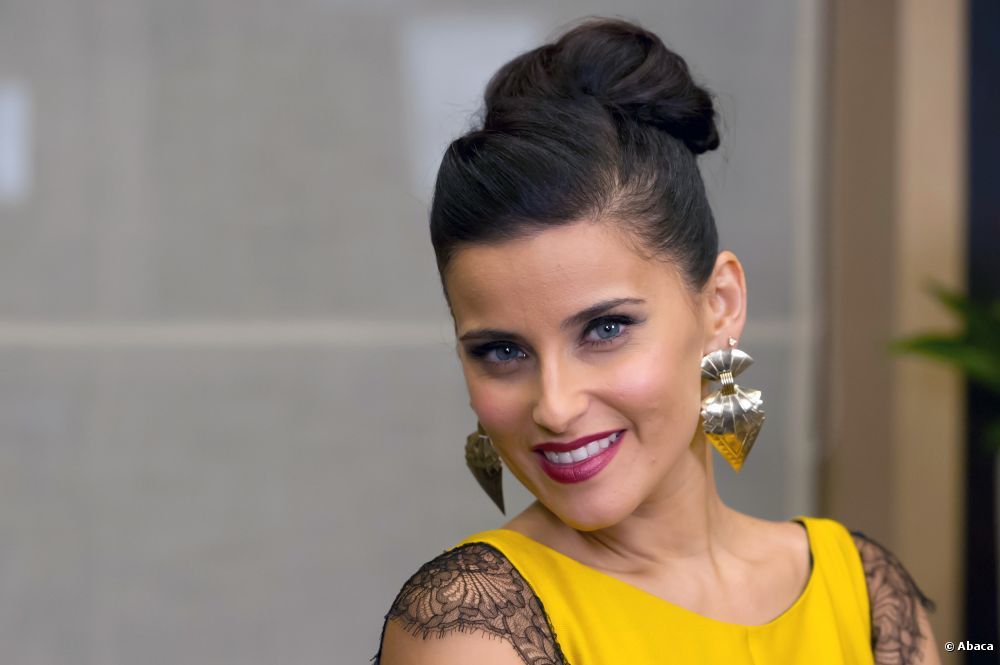 Nelly Furtado Height in cm Feet Inches Weight Body Measurements